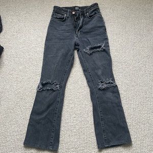 Urban Outfitters, Black ripped jeans. Size 24 at waist, inseam 25.